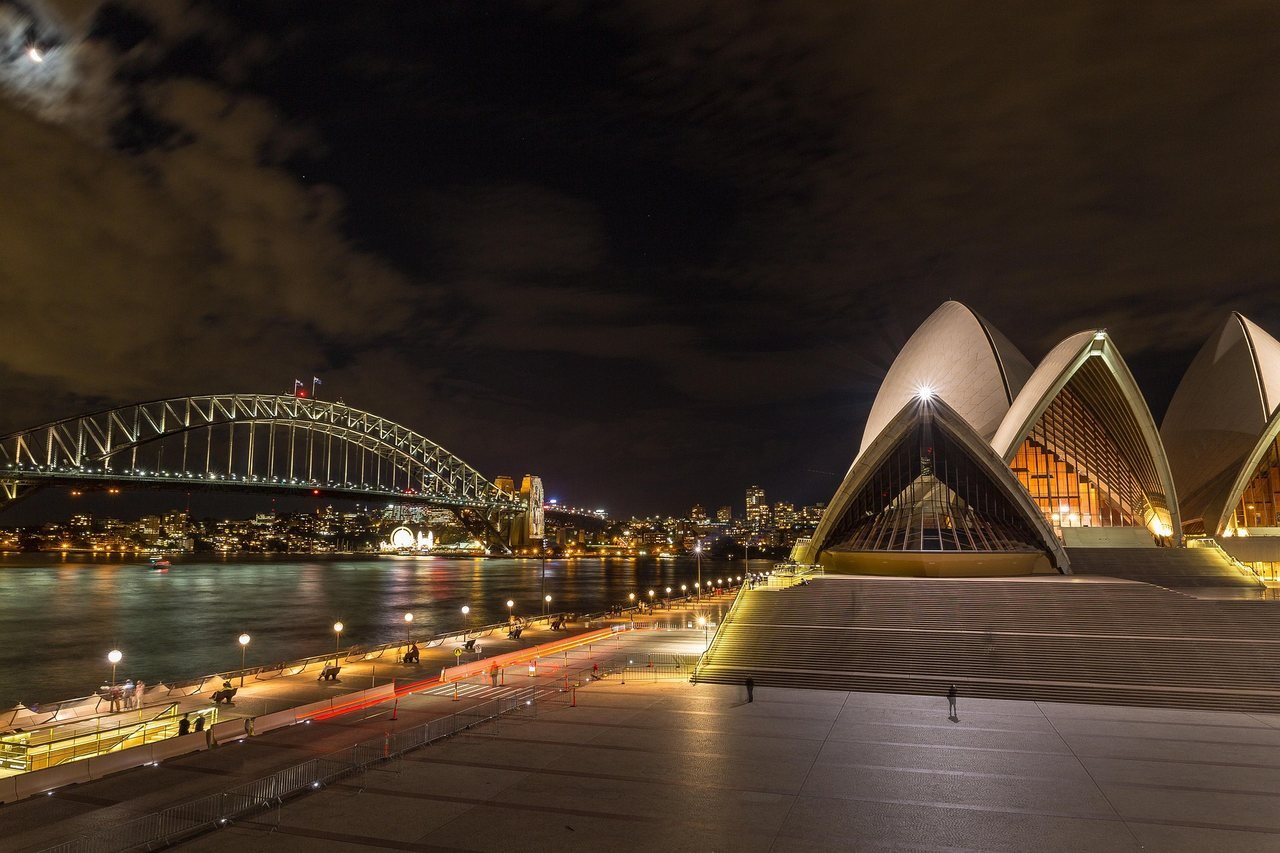 Sydney Opera House and the Harbour Bridge lit up at night
